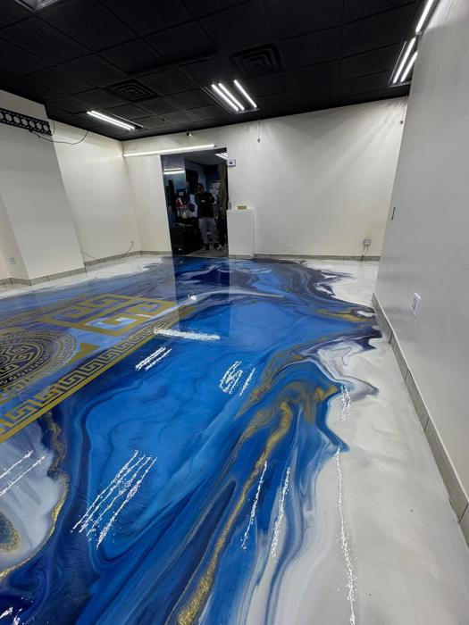 Blue metallic epoxy shop floor