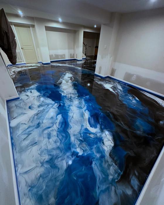Blue and white metallic epoxy basement floor