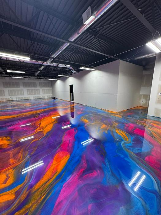 Purple and orange metallic epoxy commercial floor