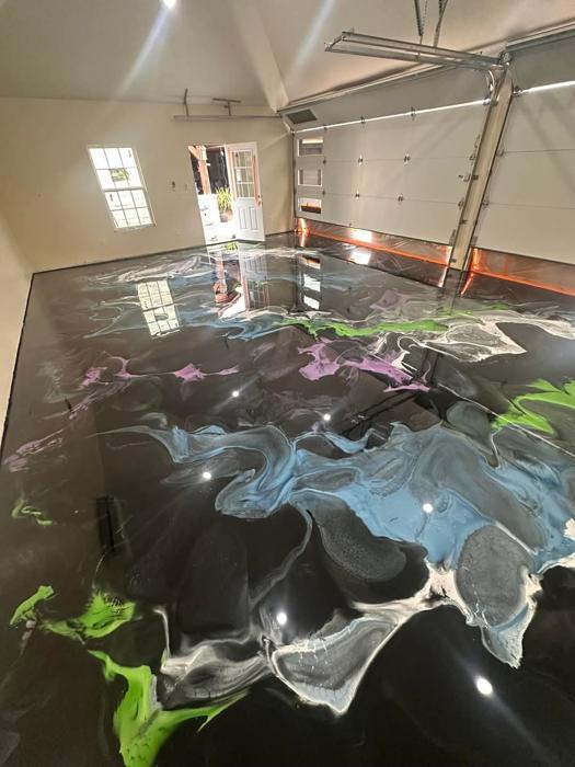 White and gray metallic epoxy garage floor